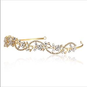 Golden tiara encrusted with rhinestones
